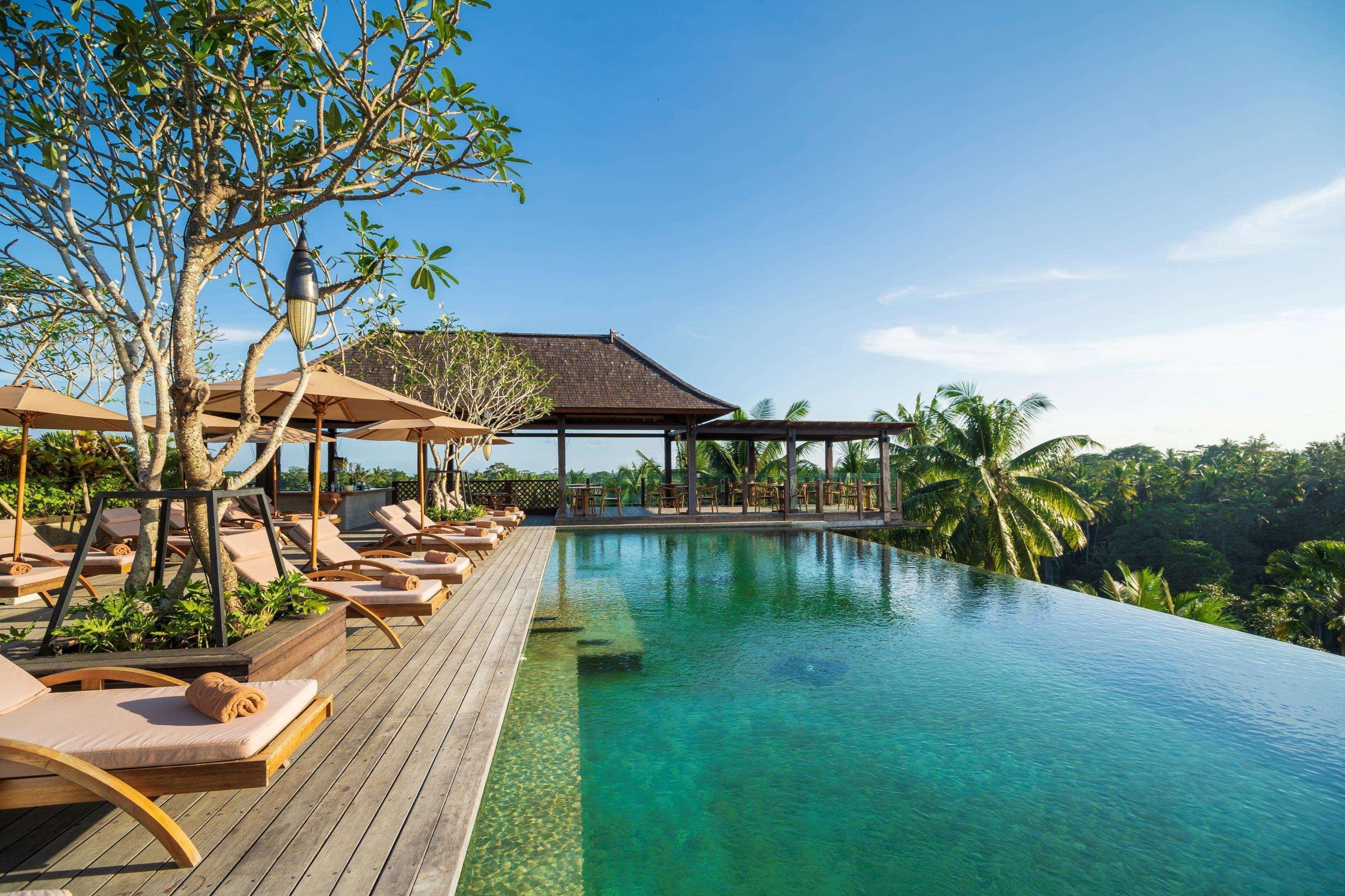 Hotel Adiwana Bisma Ubud Esterno foto The resort's infinity pool