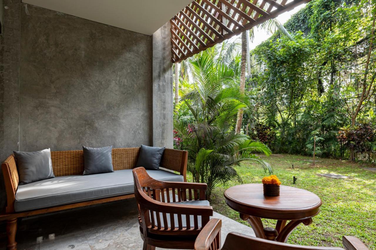 Hotel Adiwana Bisma Ubud Esterno foto The interior of a room at the hotel