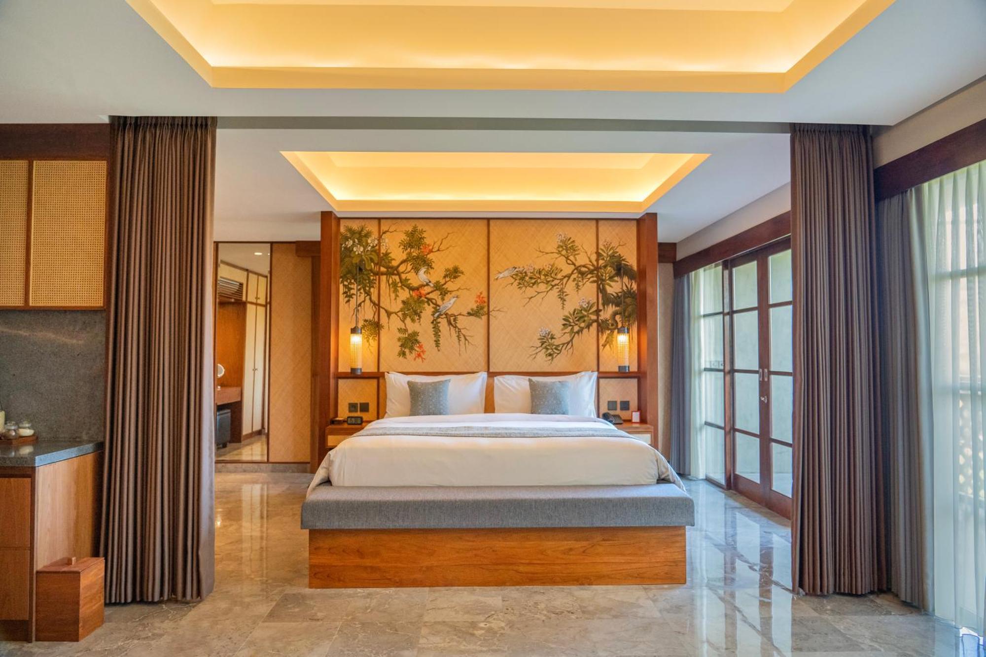 Hotel Adiwana Bisma Ubud Esterno foto A bedroom at the hotel