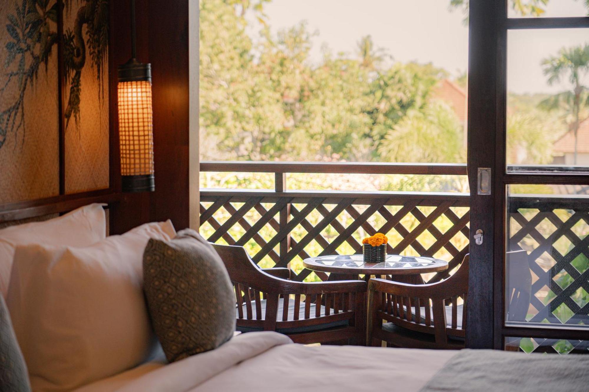 Hotel Adiwana Bisma Ubud Esterno foto A guest room at the hotel