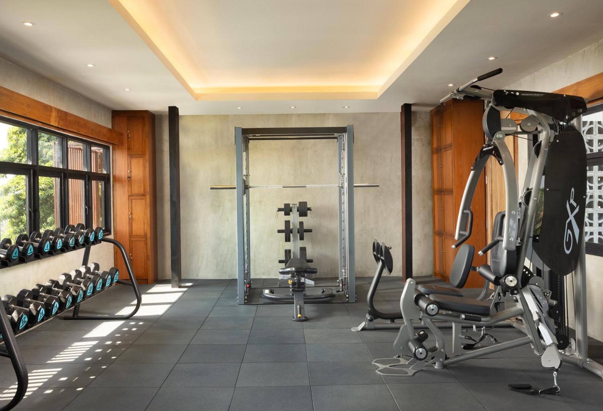 Hotel Adiwana Bisma Ubud Esterno foto The gym at the hotel