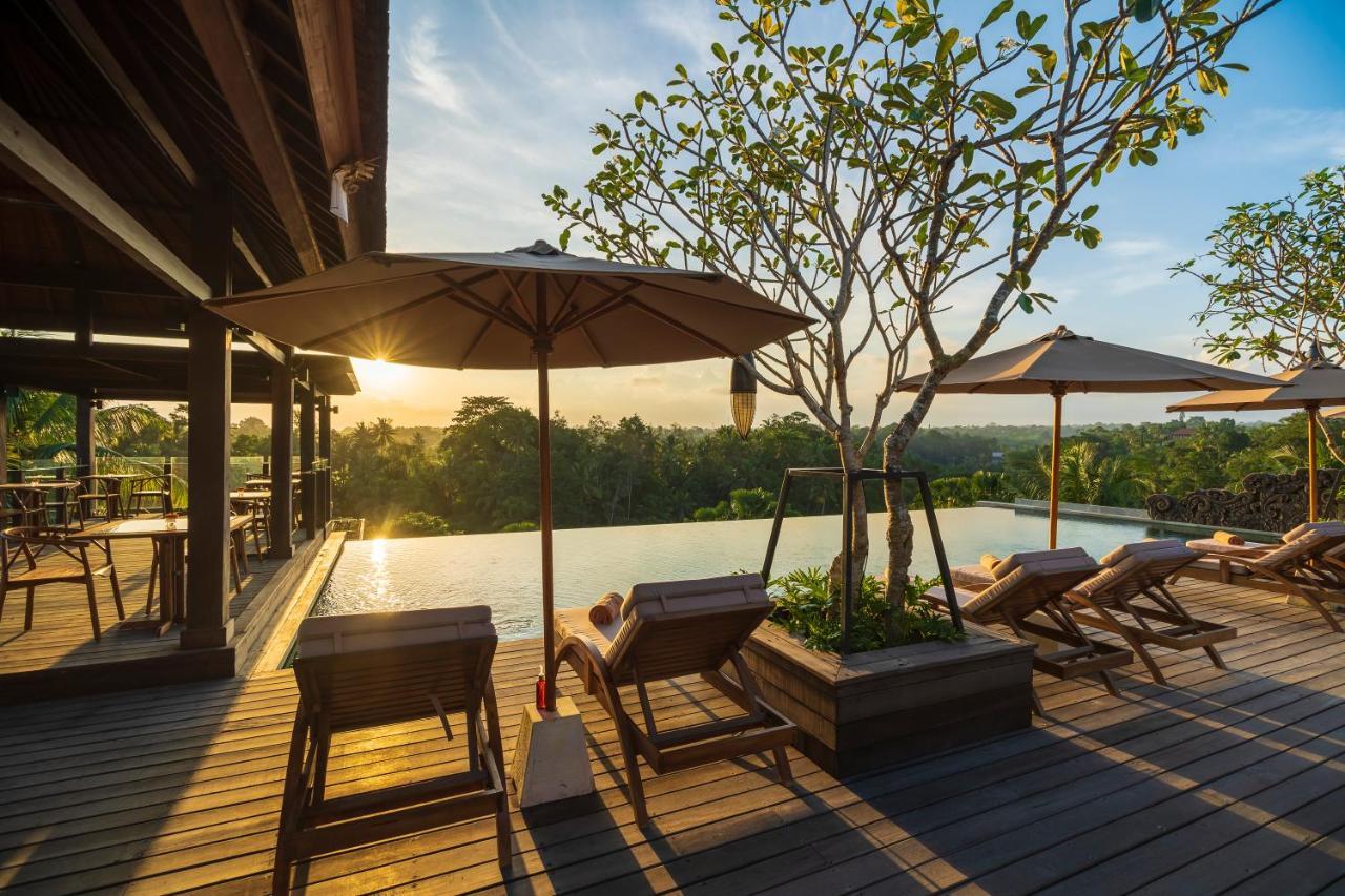 Hotel Adiwana Bisma Ubud Esterno foto The swimming pool at the resort